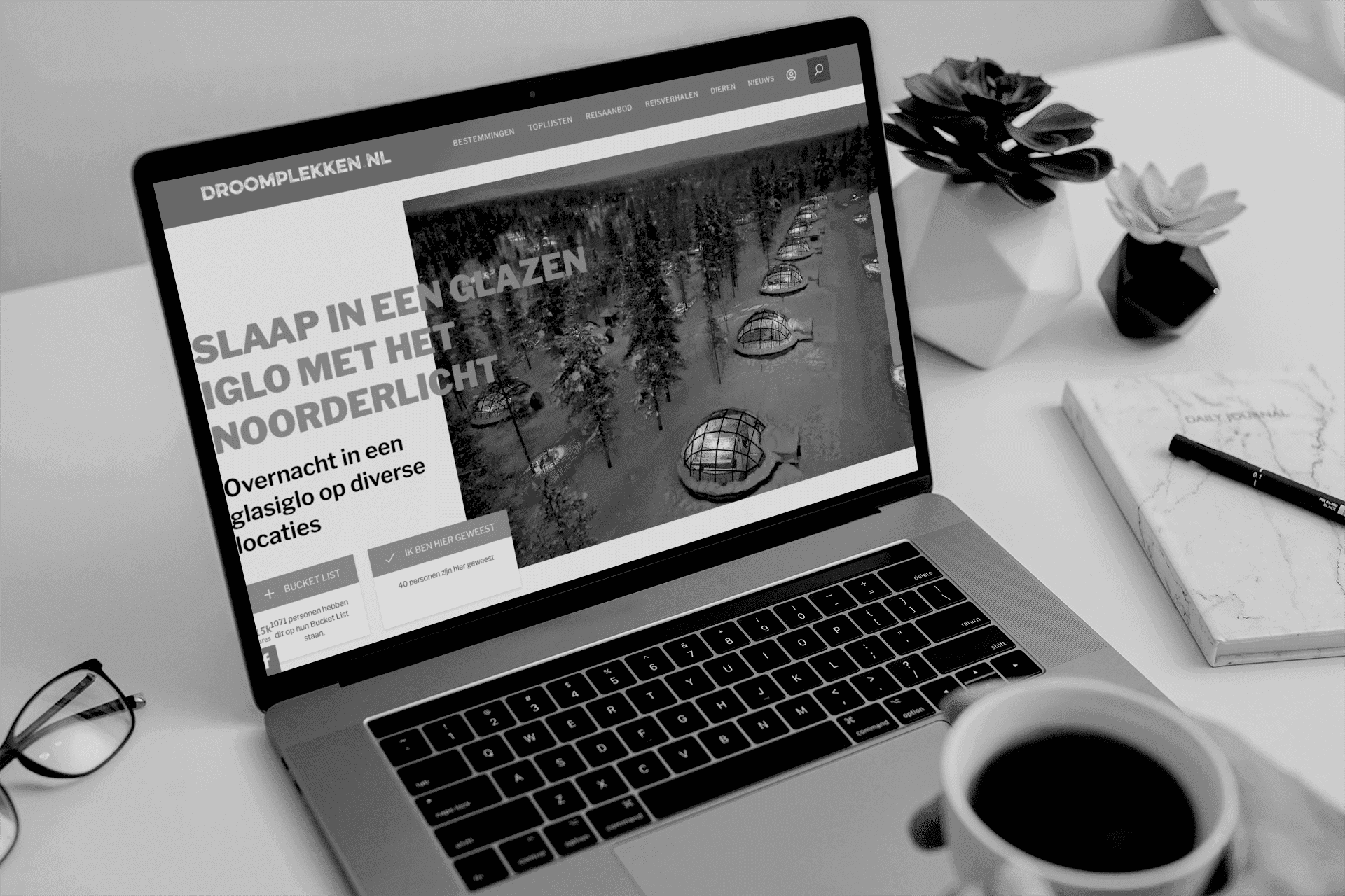 mockup-of-a-macbook-pro-placed-on-a-white-work-desk-next-to-some-plant-pots-495-el